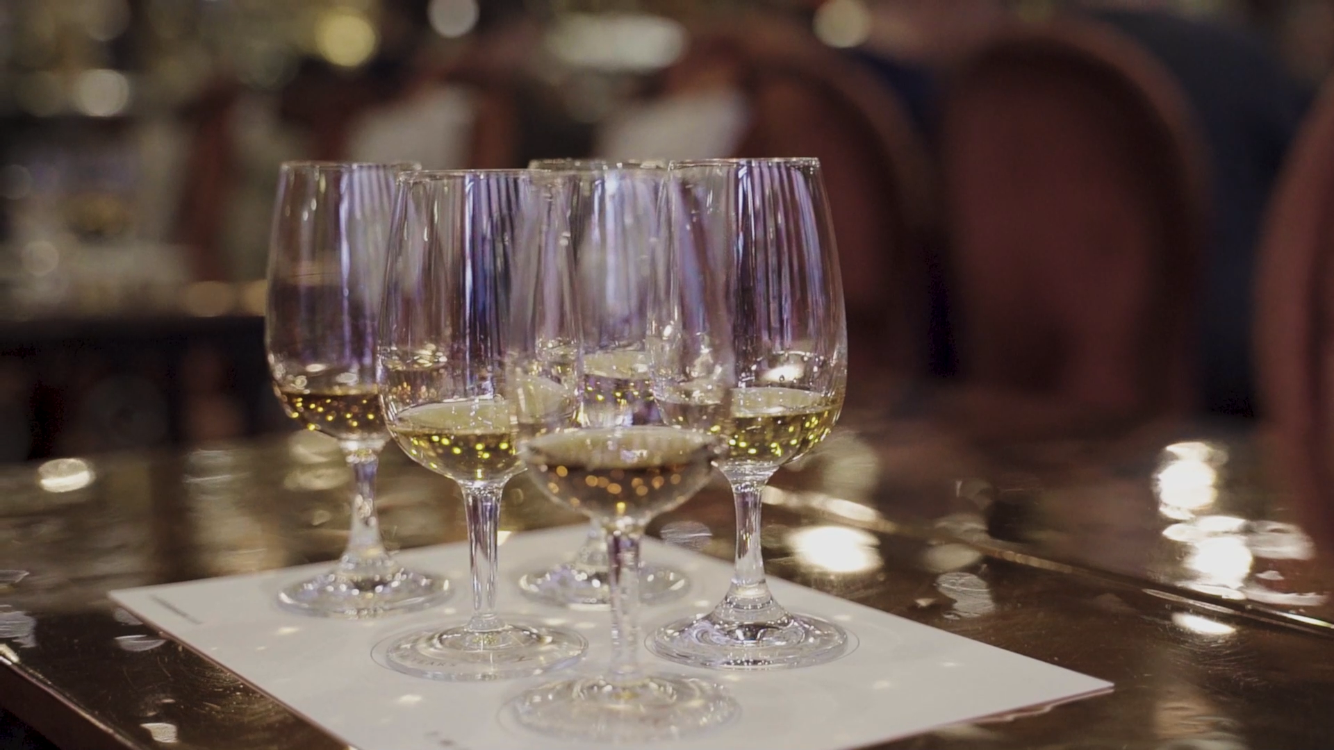 An images of a number of glasses sitting on a table