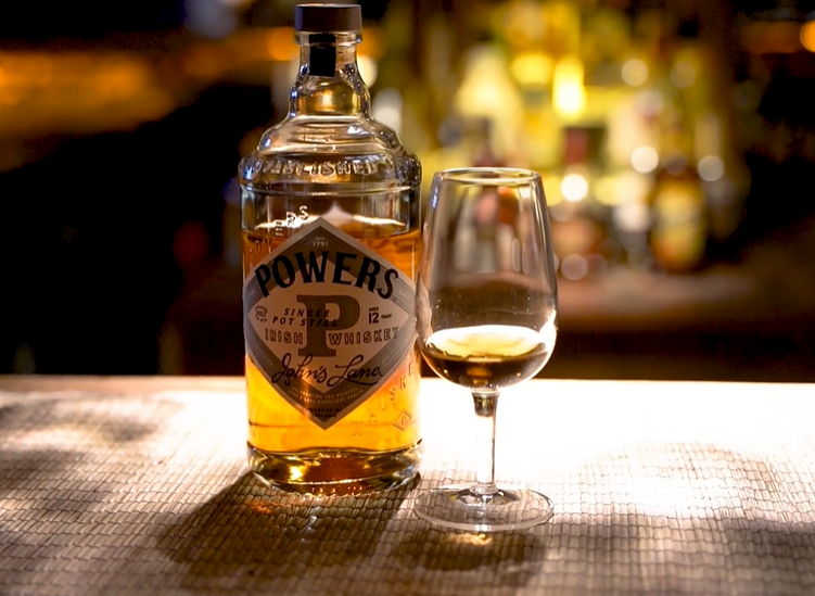 Powers Johns Lane bottle and a whiskey tasting glass